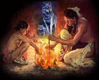 Indianer mit Enkel am Feuer
